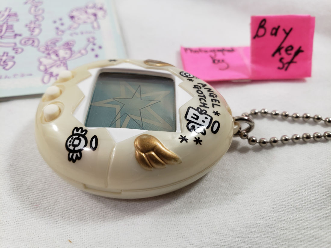Tamagotchi Angelgotchi White Buttons Gold Wings tama gotchi manual