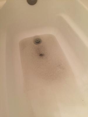 sewage coming up through bathtub