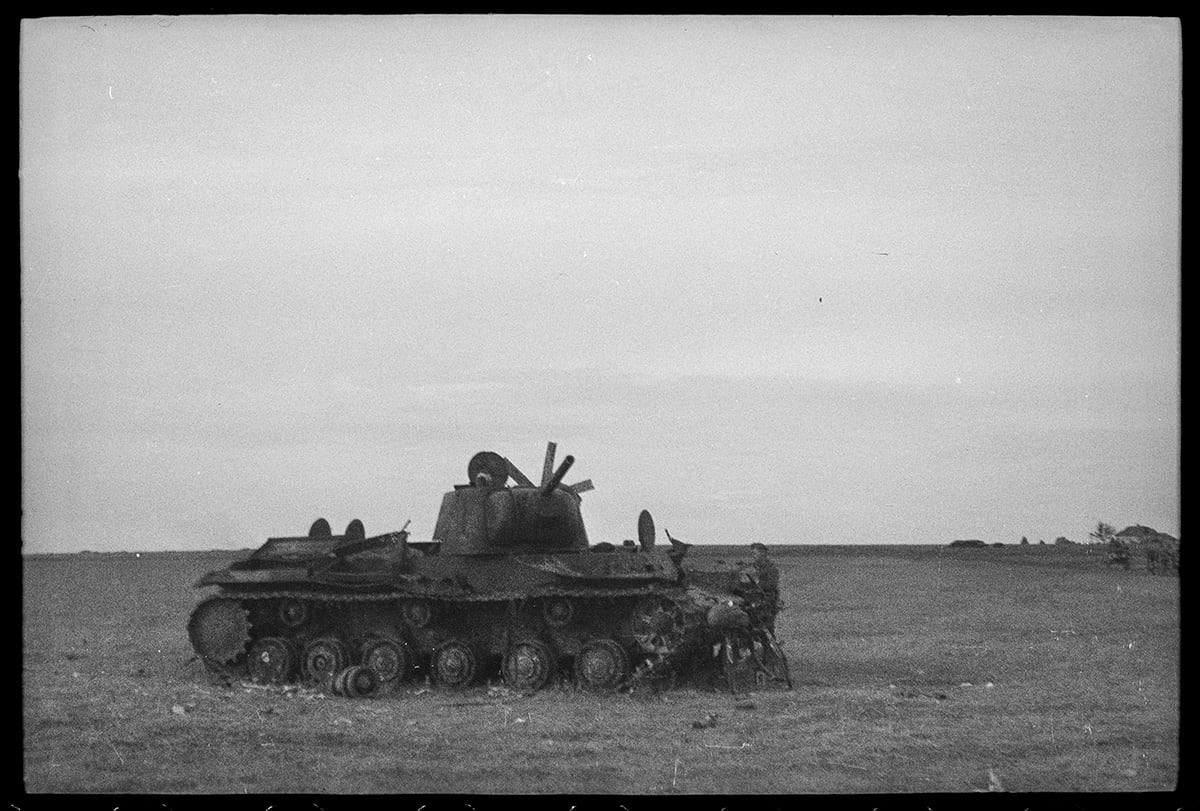 132 a german soldier near a downed soviet kv 1 tank u