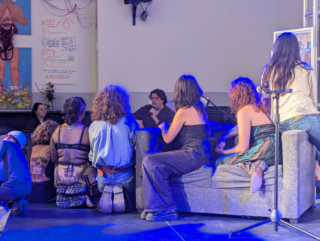 Photo of a group of us senior students listening intently to a teacher