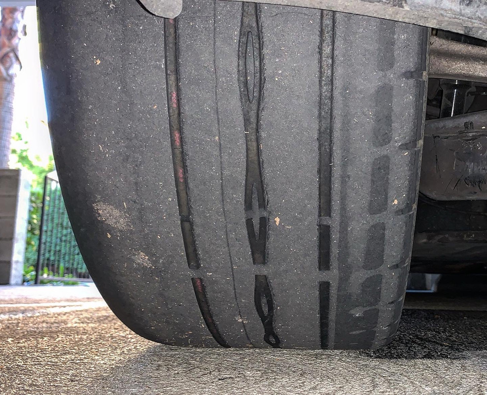 Performance tire showing even tread wear from proper setup and alignment