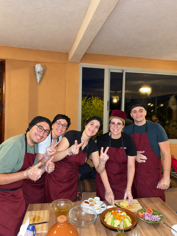 Chefs of Chez Moussa posing together in the restaurant