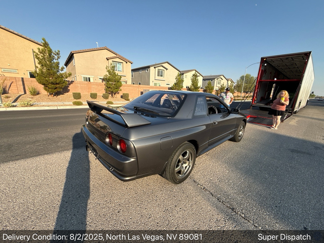 Vehicle secured on carrier