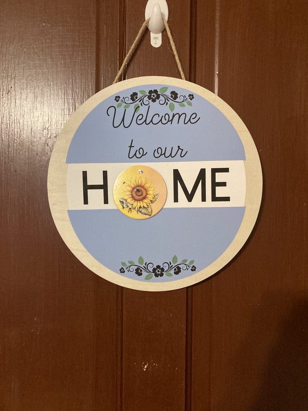 handcrafted welcome home sign