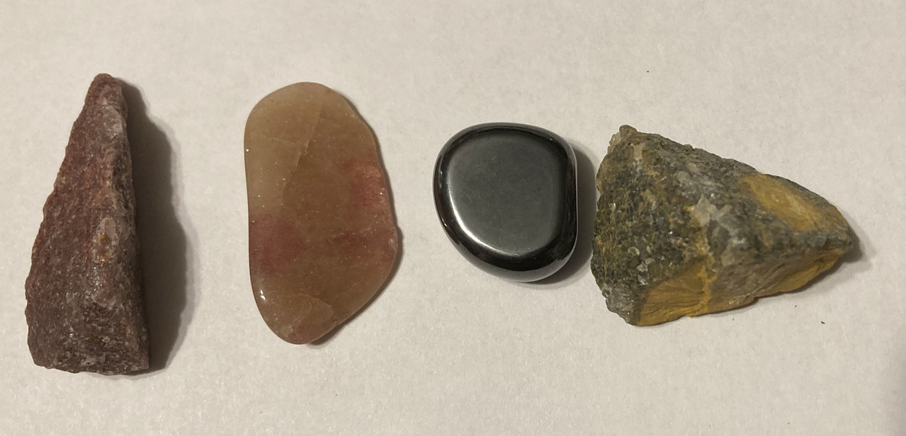 raw guava quartz, tumbled red aventurine, tumbled magnetic hematite, raw kabamby ocean jasper, 15ml Harmony oil, information sheet