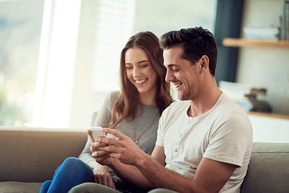 couple looking at laptop computer