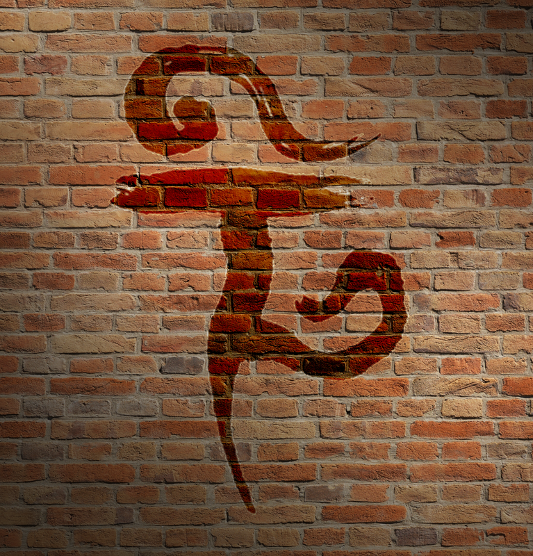 image of a tulpa symbol on a brick wall
