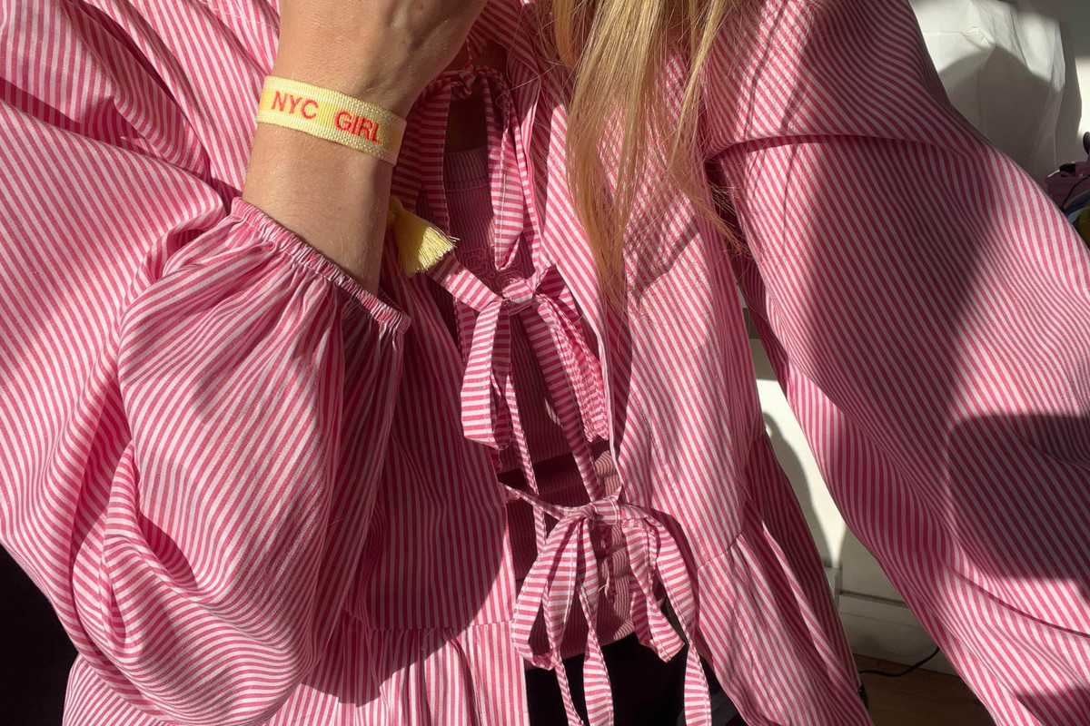lotta mae owner wearing a personalized embroidered bracelet