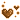Pixel art of two floating hearts