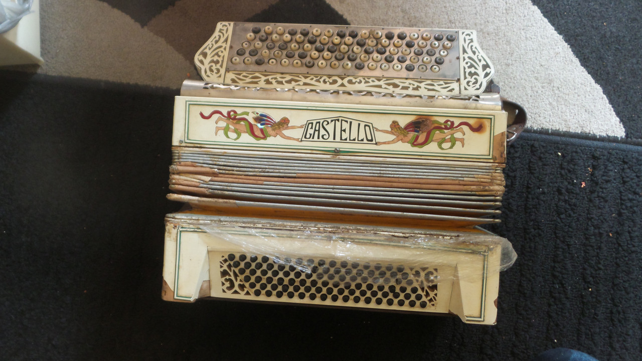castello-button-accordian.jpg