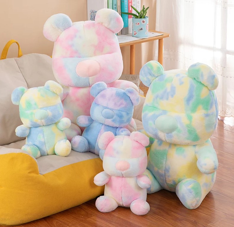 A group of stuffed animals Description automatically generated