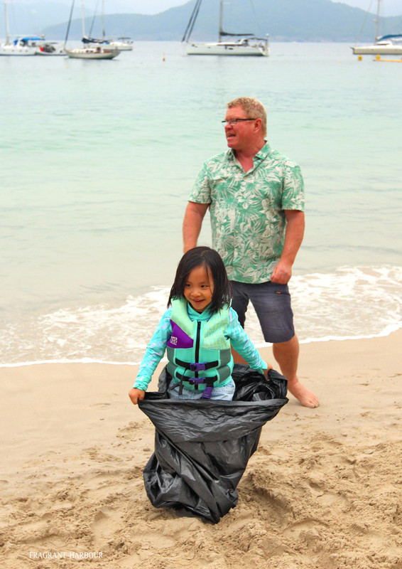 Mark Ashton judges a finisher (New Year's Beach Day 2025)