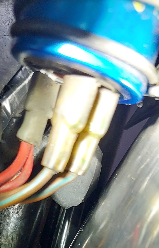 Original and new oil junction block.