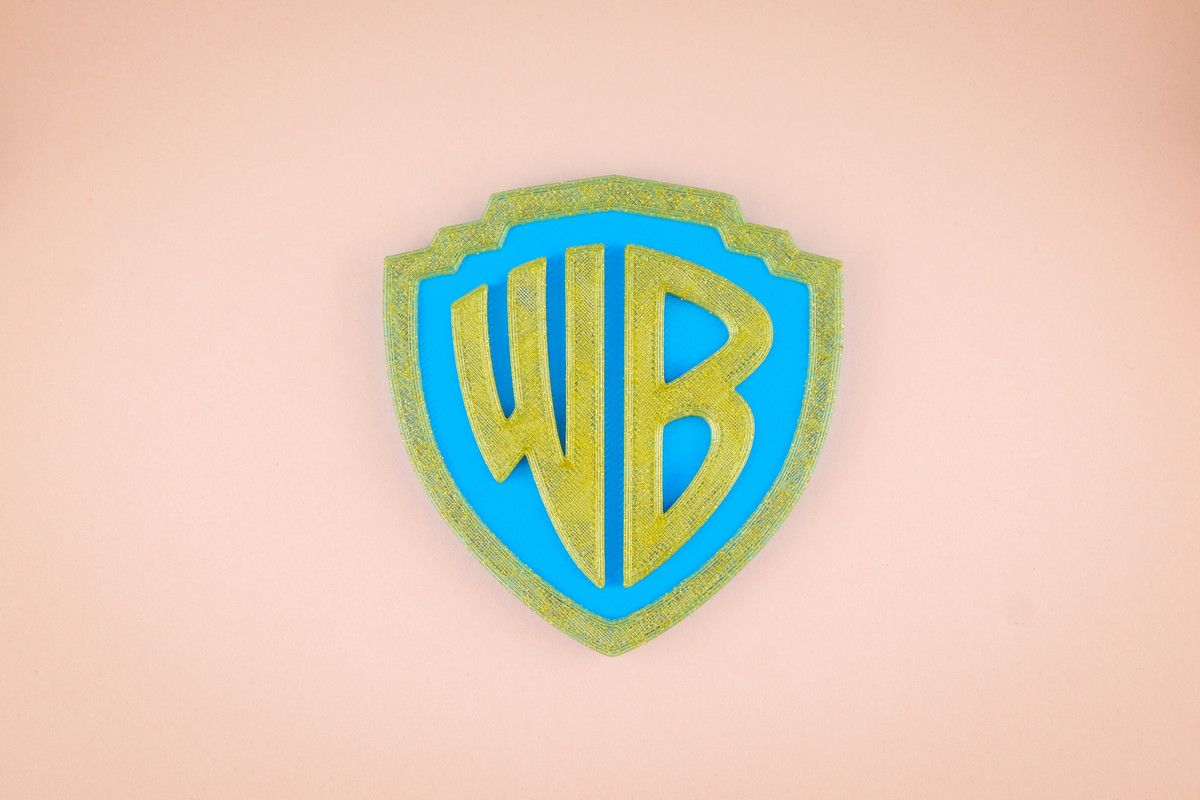 20th Century Fox Logo in yellow colors in a light blue and soft pink background. There are wooden toys for a decorative.