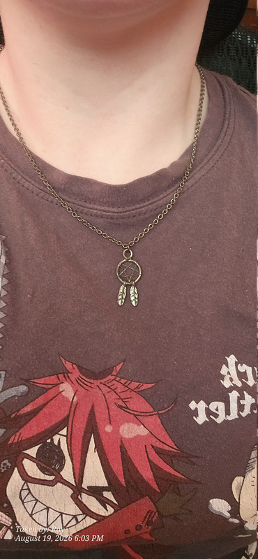 close up of my tiny pentagram dream catcher necklace