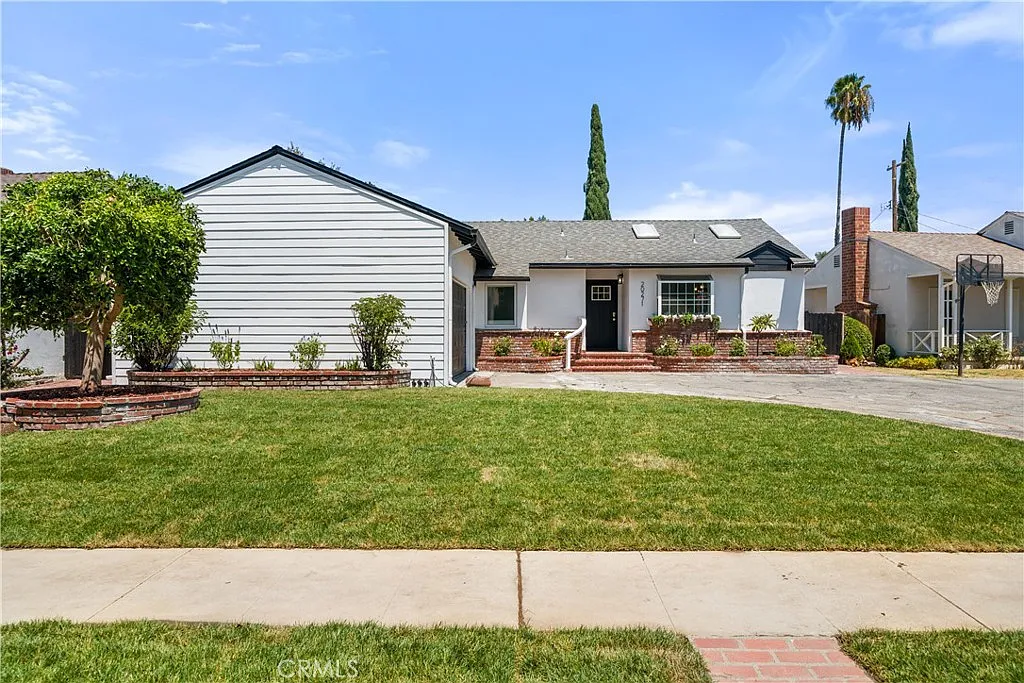 Front exterior of the home for sale at 20271 Mobile Street in Winnetka, California