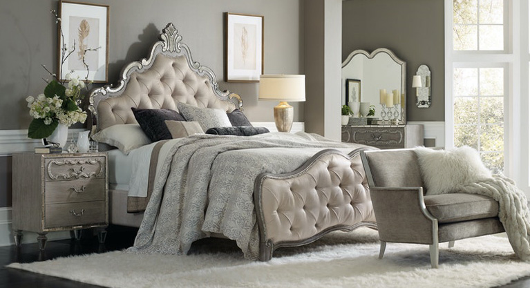 Live happily-ever-after with a fairy-tale bed you have dreamed of all your life. This upholstered King Panel Bed sparkles stylishly in the Epoque finish, a greige with shimmer on Oak veneers with mirrored accents. The Shimmering Boucle tufted upholstery adds softness as the perfect finishing touch, creating an inviting refuge. Headboard can be used alone. Pursue serenity at home. Create your own personal sanctuary, a special place where you can experience comfort within.