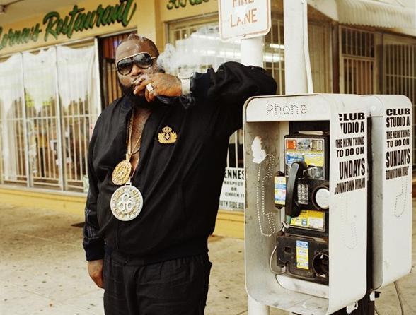Rick Ross smoking a cigarette (or weed)
