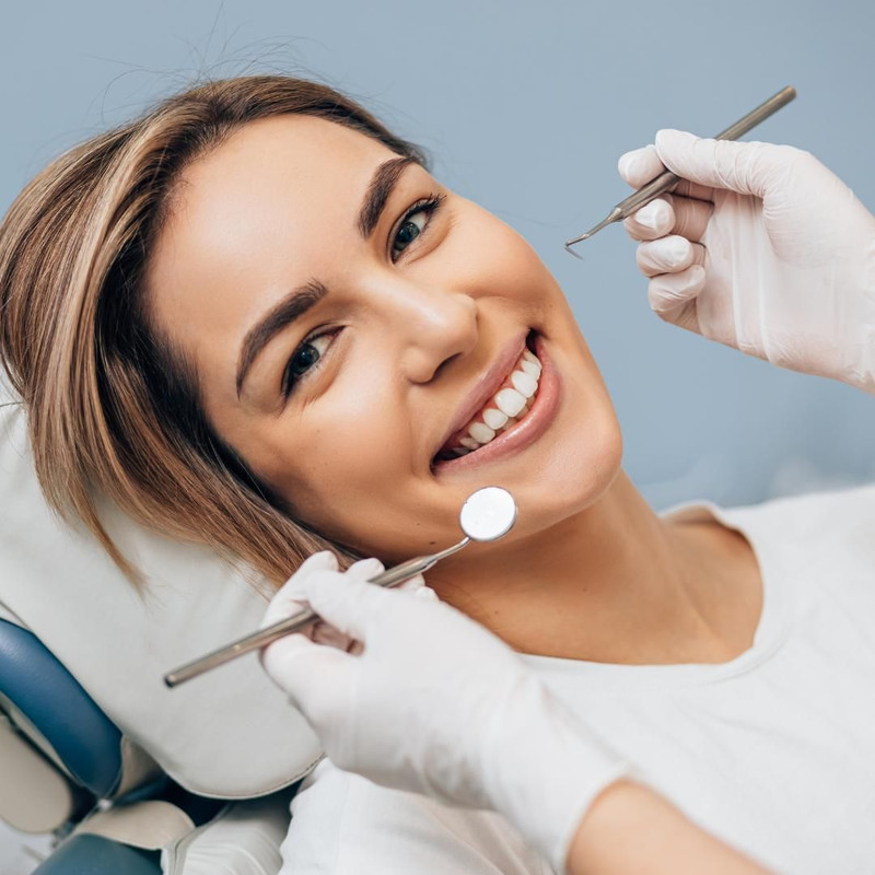 Dental Professional Applying Adhesive for Veneers