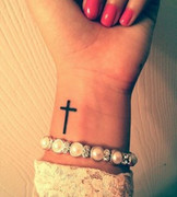 Black-cross-wrist-tattoo-280x311