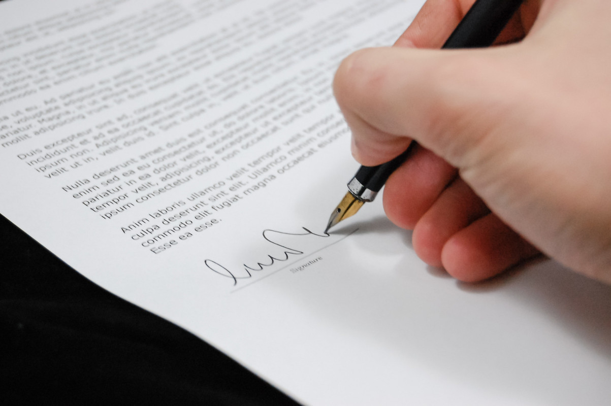 Signature and pen