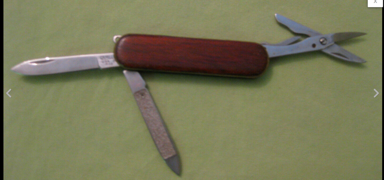 Camillus wood finish three