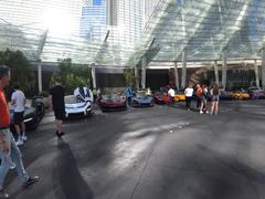 On-site operations — detailers preparing vehicles before doors open