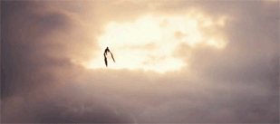 https://i.postimg.cc/4dKk7mS2/Saphira-flying-from-clouds.gif
