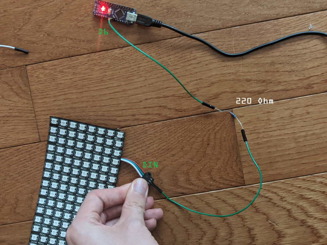 A resistor connected between an LED matrix and an Arduino Nano