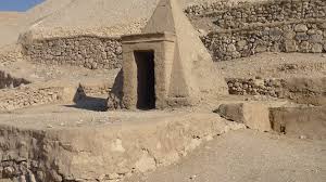 Artisans carving statues and painting