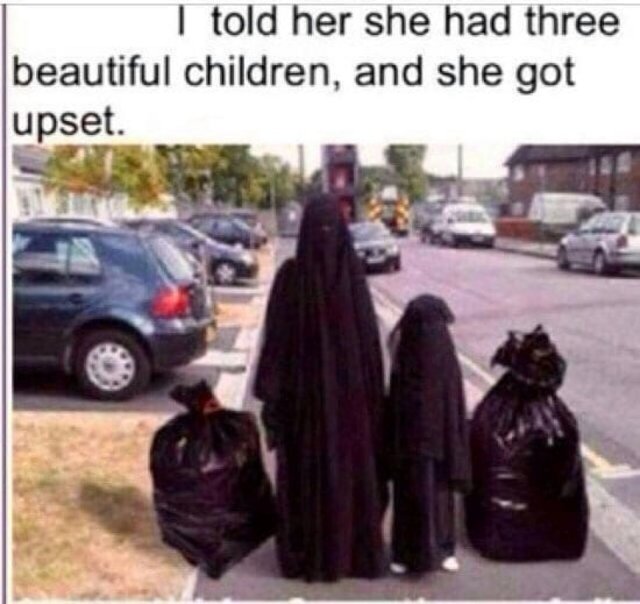 The-image-of-a-burka-clad-woman-and-her-daughter-alongside-two-bin-bags-has-gone-viral-on-Facebook