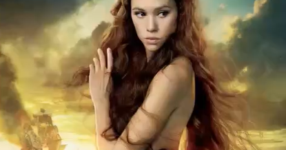 naked girl who is showing her boobs and pussy (completely nude).