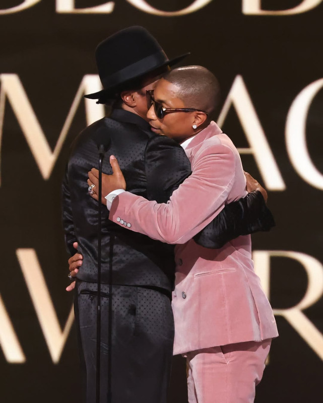 Congratulations to Pharrell Williams who just received the Global Impact Award at the Grammys (1)