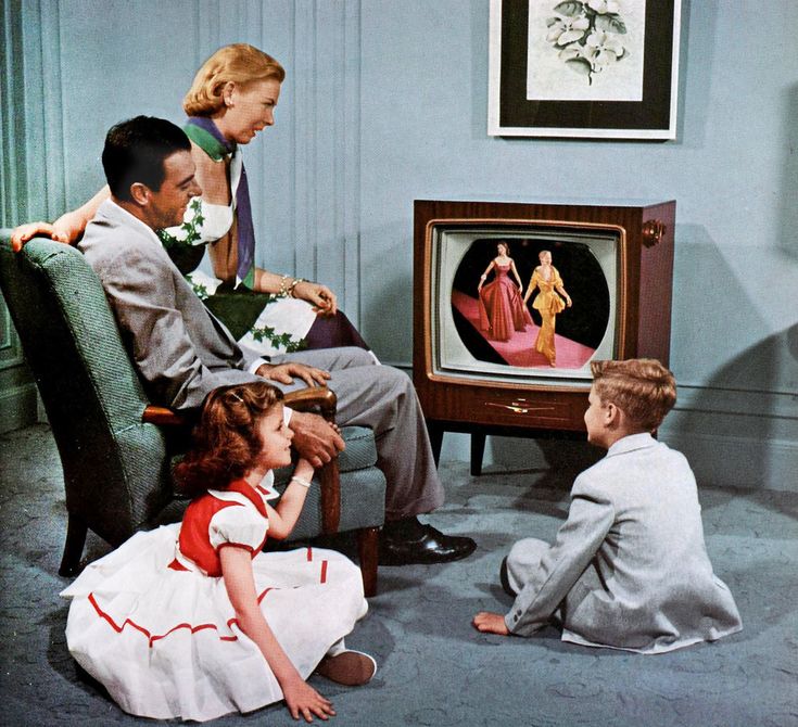 Elegant family watching TV