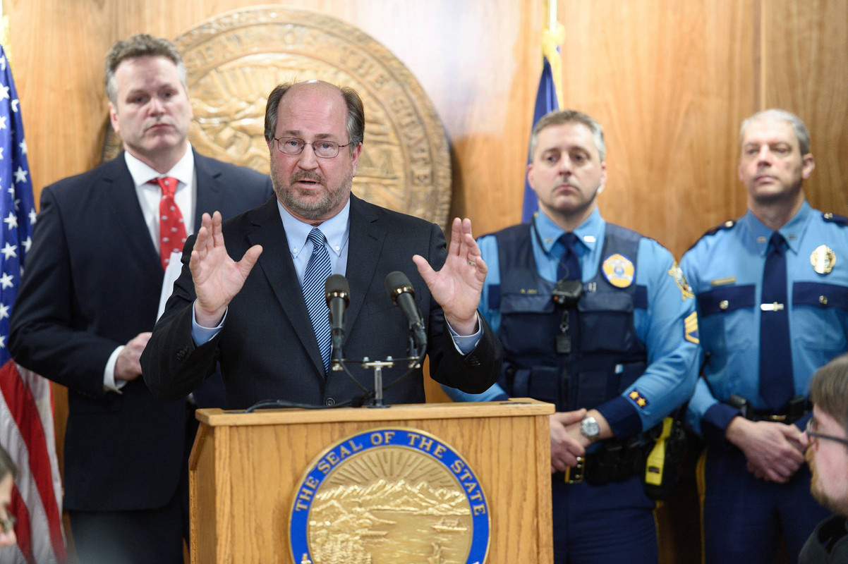 Kevin Clarkson as Alaska Attorney General at a press conference with Gov. Mike Dunleavy, left, and Alaska State Troopers at the Capitol in 2019