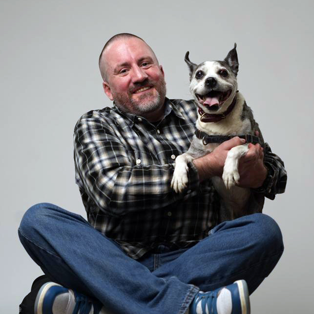 Sean Wallace with Daisy, Chief Morale Officer