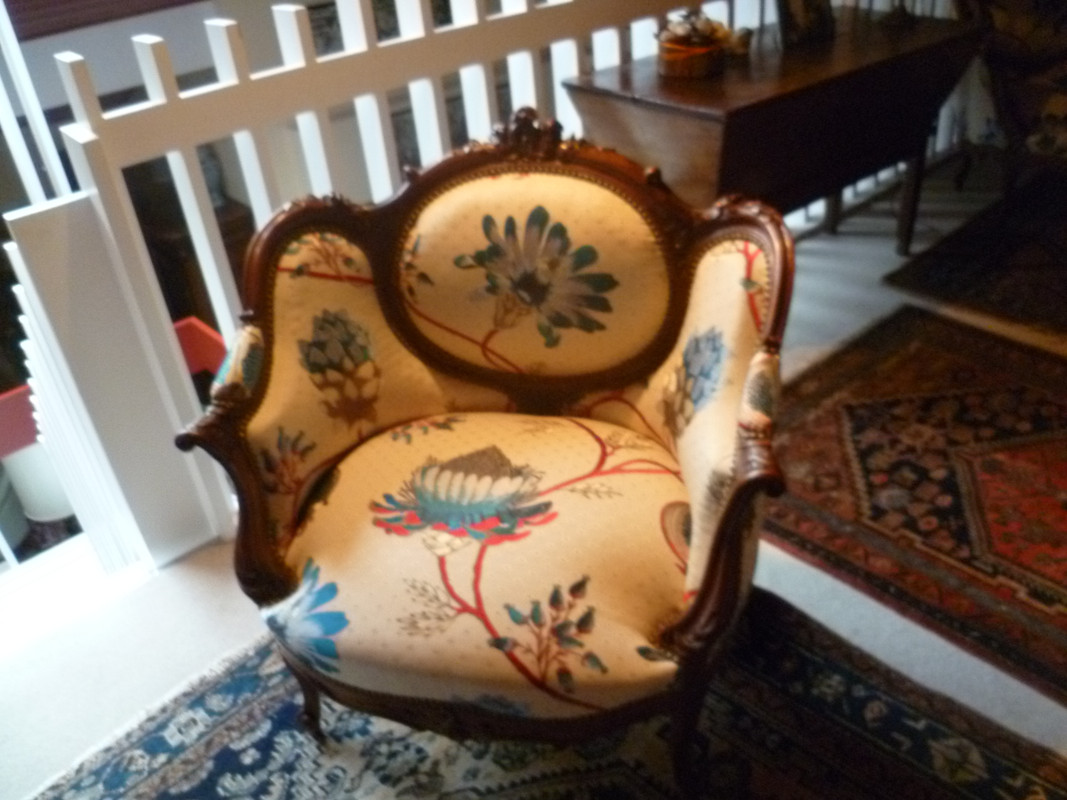 Fauteuil rénové de tapissier décorateur