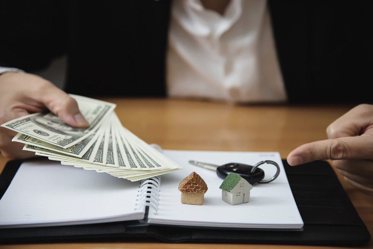 business man show money bank note make financial plan invite people sell buy house car monetary prop