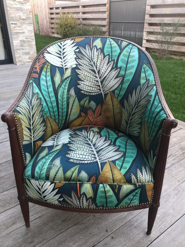 Fauteuil rénové de tapissier décorateur