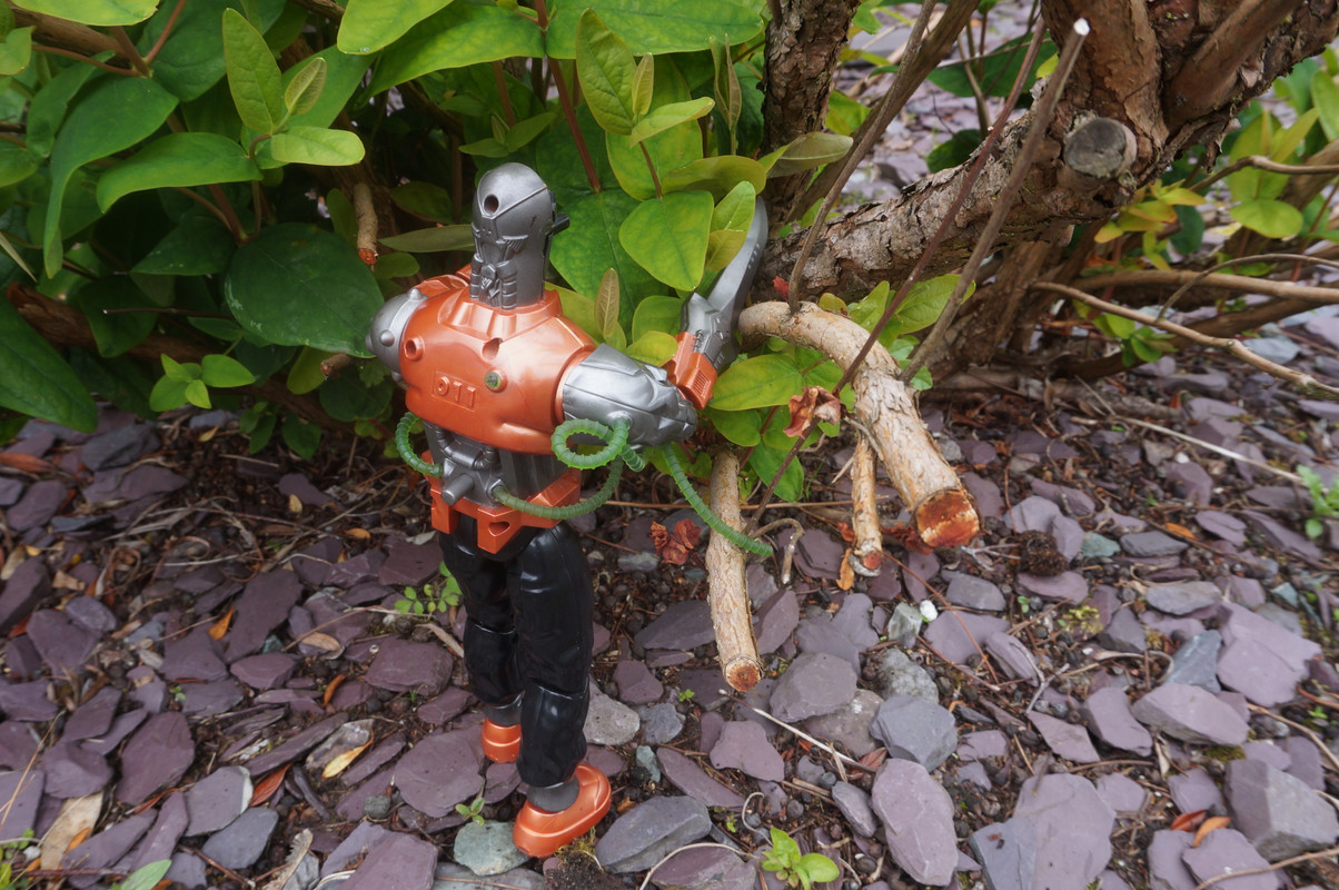 Toxic robot pruning trees and bushes. 08597108-53-D5-481-D-880-C-8-D6670-D9794-A