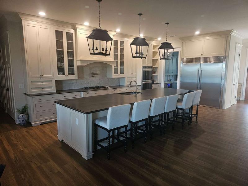 Light, warm kitchen cabinetry with a centered island