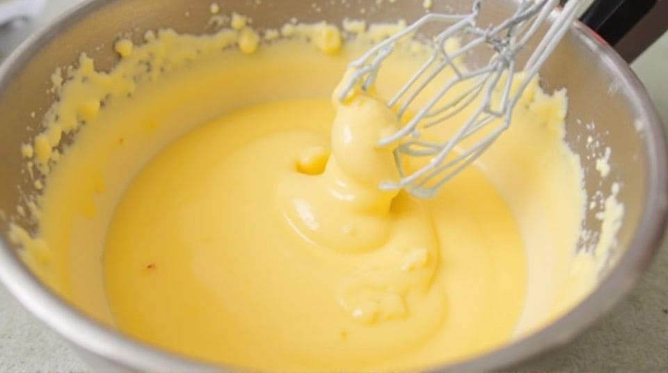 Mixing mango puree with cream and condensed milk | آم کا مکسچر