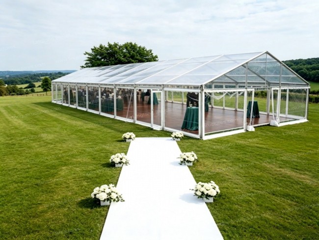 Luxury wedding banquet tent interior with chandeliers and dance floor