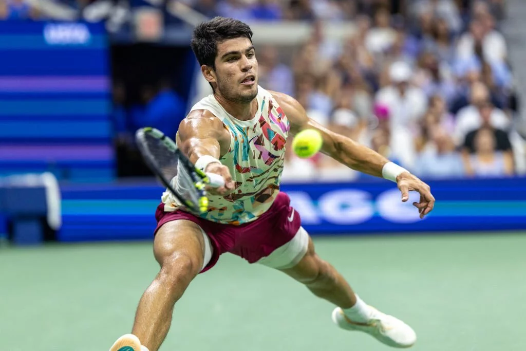 Carlos Alcaraz of Spain in action against Alexander Zverev of Germany/Photo by Tim Clayton