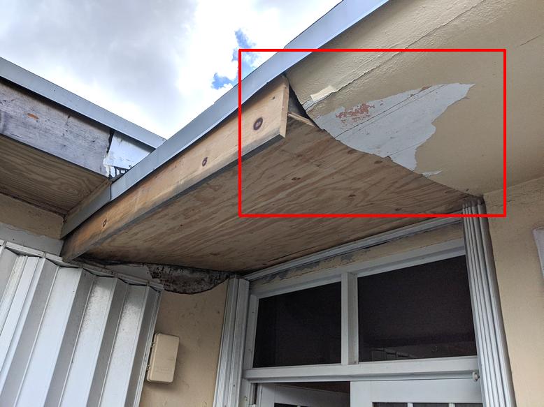 Transition from a straight plywood soffit to a curved plaster soffit
