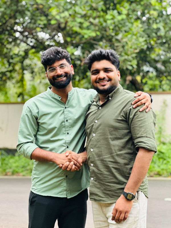 Muhammad Ansar in a business meeting with exporter Rimshad.