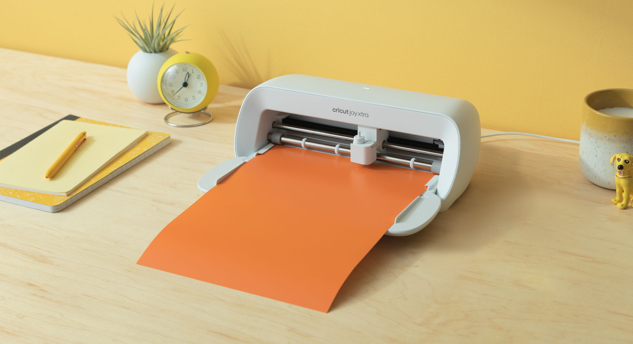 Máquina de corte compacta Cricut Joy en color menta.