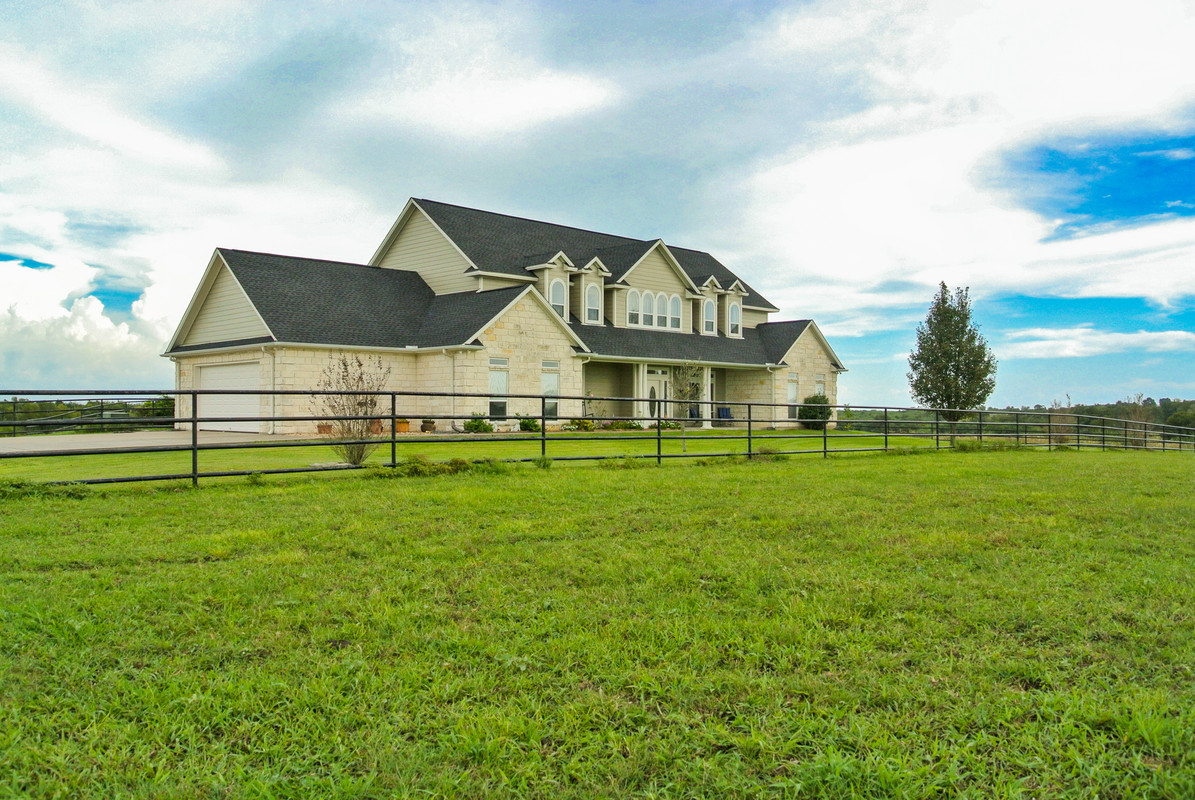 Incredible 70+ acre cattle ranch located in the desirable Washington County TX, and only a stone’s throw away from Washington on the Brazos.  A custom 4,000 sqft estate sits upon the tallest hill on the property offering panoramic views from both the front and back porches.  This immaculate home boasts 4 bedrooms and 3.5 bathrooms with a master suite you must see to believe.   Beautiful trees are scattered throughout the rolling property lending afternoon shade to the livestock and 2 large tanks provide bountiful water. A ranch like this is hard to find, so don’t wait!