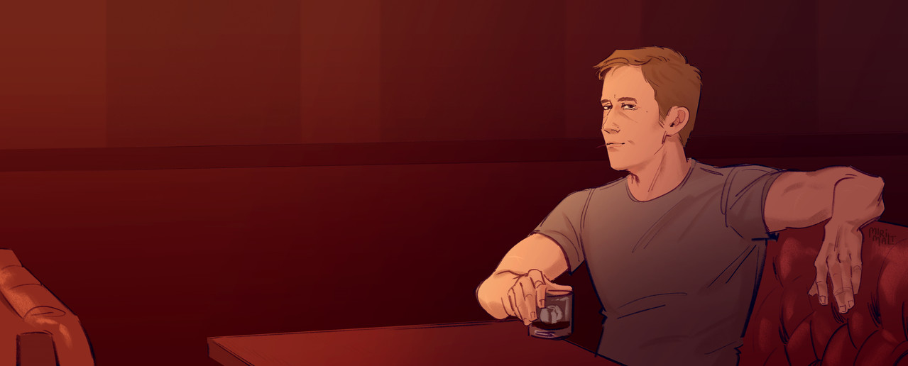 Driver sitting at the bar with his drink in his hand