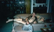 Lying-on-the-sofa-wearing-a-robe